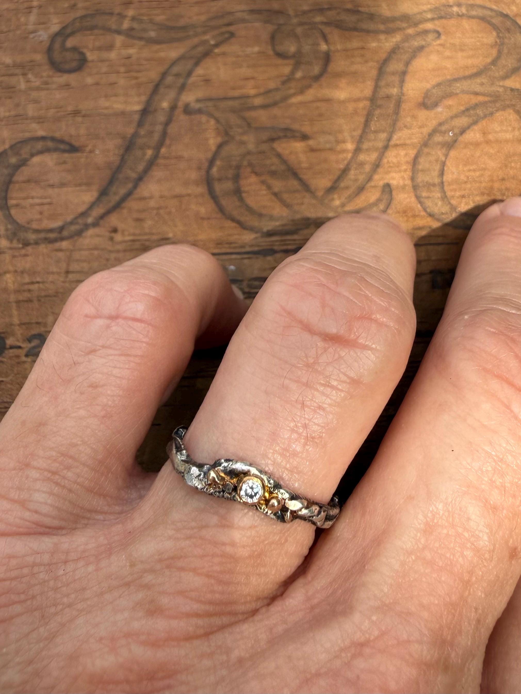 Fused Sterling Silver & Recycled 14K Gold with  a 2mm Moissanite Diamond.