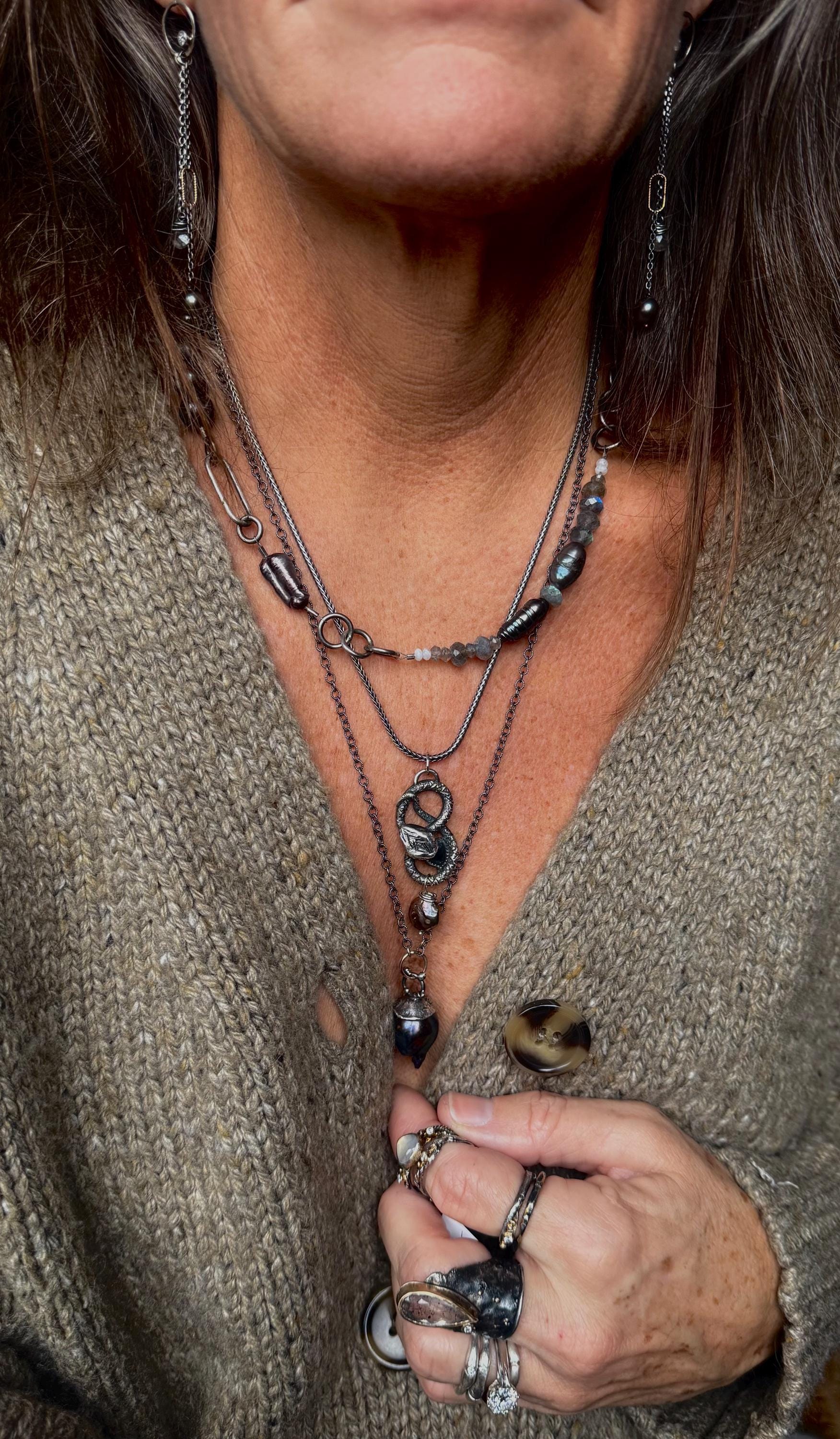 Giant Black Baroque Pearl Necklace with Sterling silver Chain and 14k Gold; 24” long.