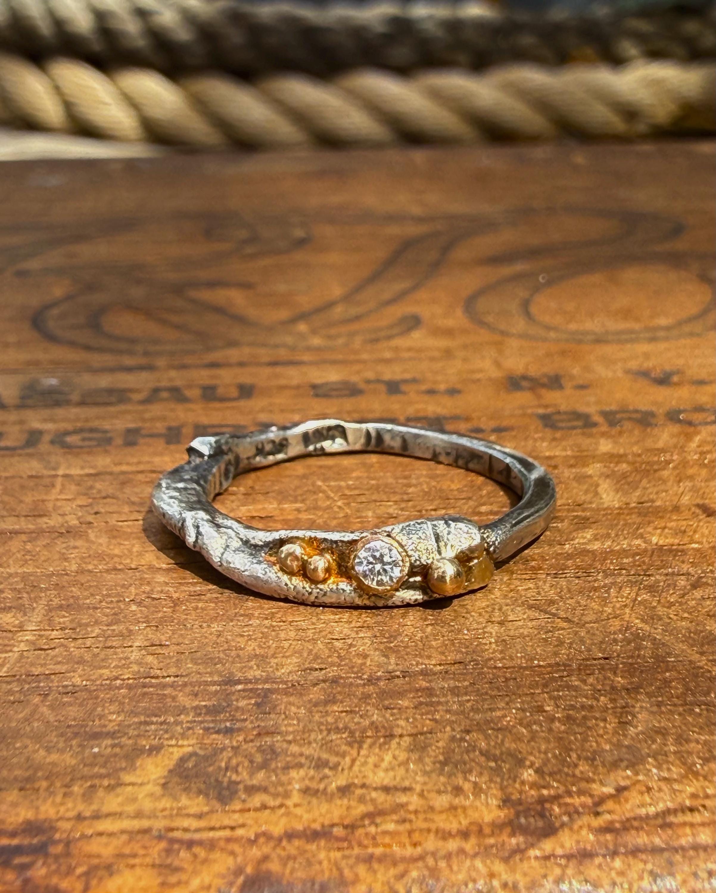 Fused Sterling Silver & Recycled 14K Gold with  a 2mm Moissanite Diamond.