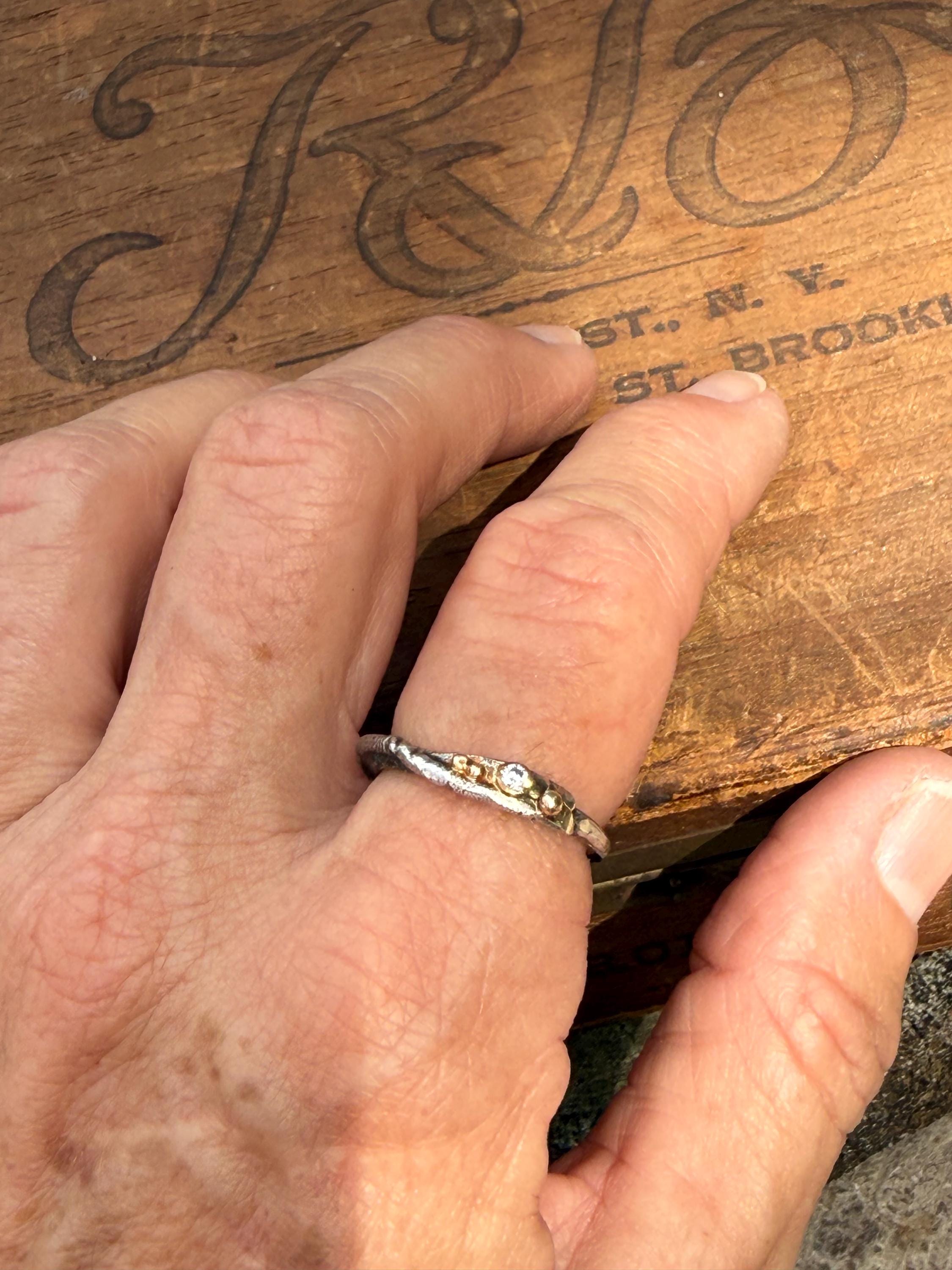 Fused Sterling Silver & Recycled 14K Gold with  a 2mm Moissanite Diamond.