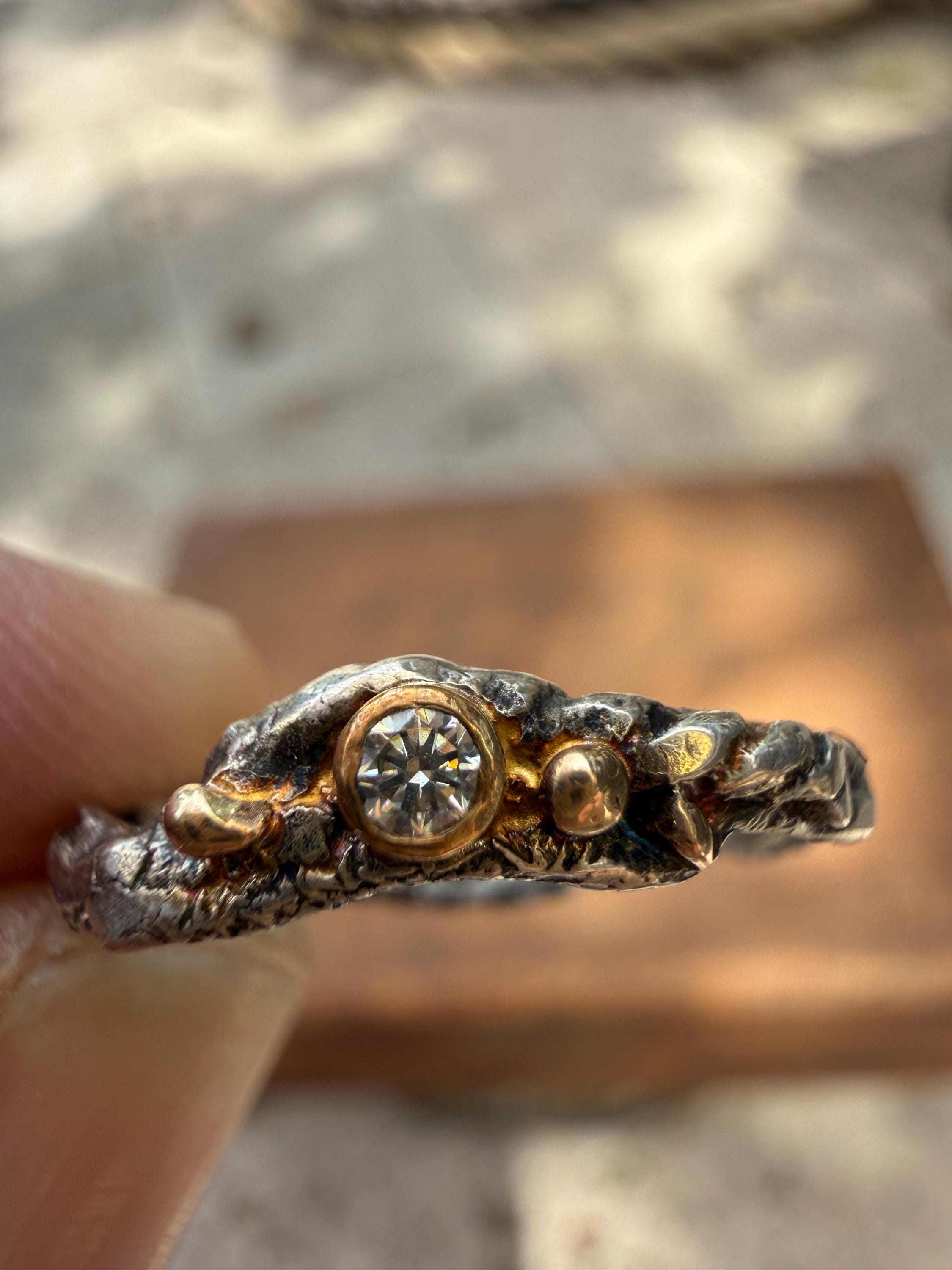 Fused Sterling Silver & Recycled 14K Gold with  a 2mm Moissanite Diamond.