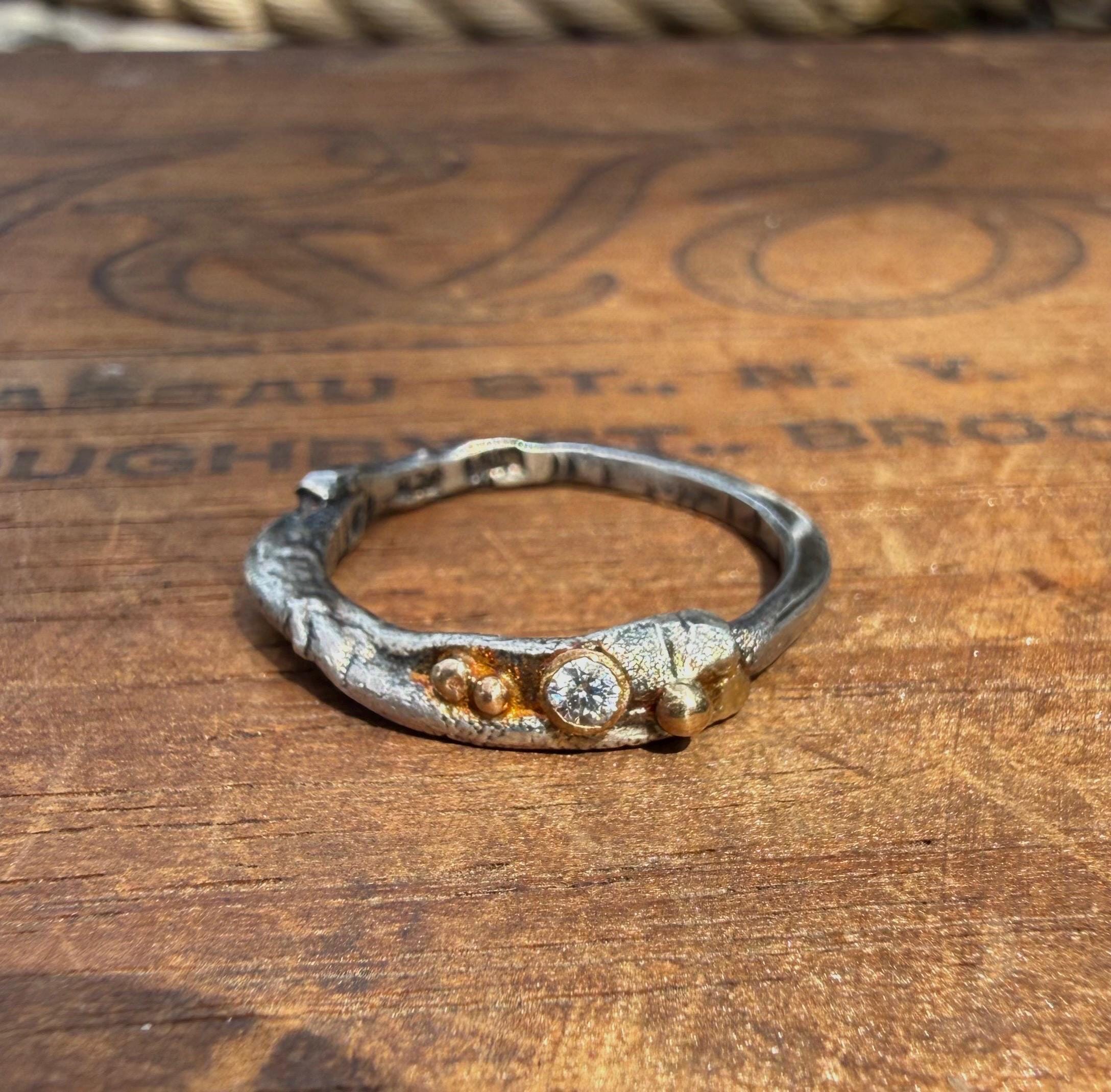 Fused Sterling Silver & Recycled 14K Gold with  a 2mm Moissanite Diamond.