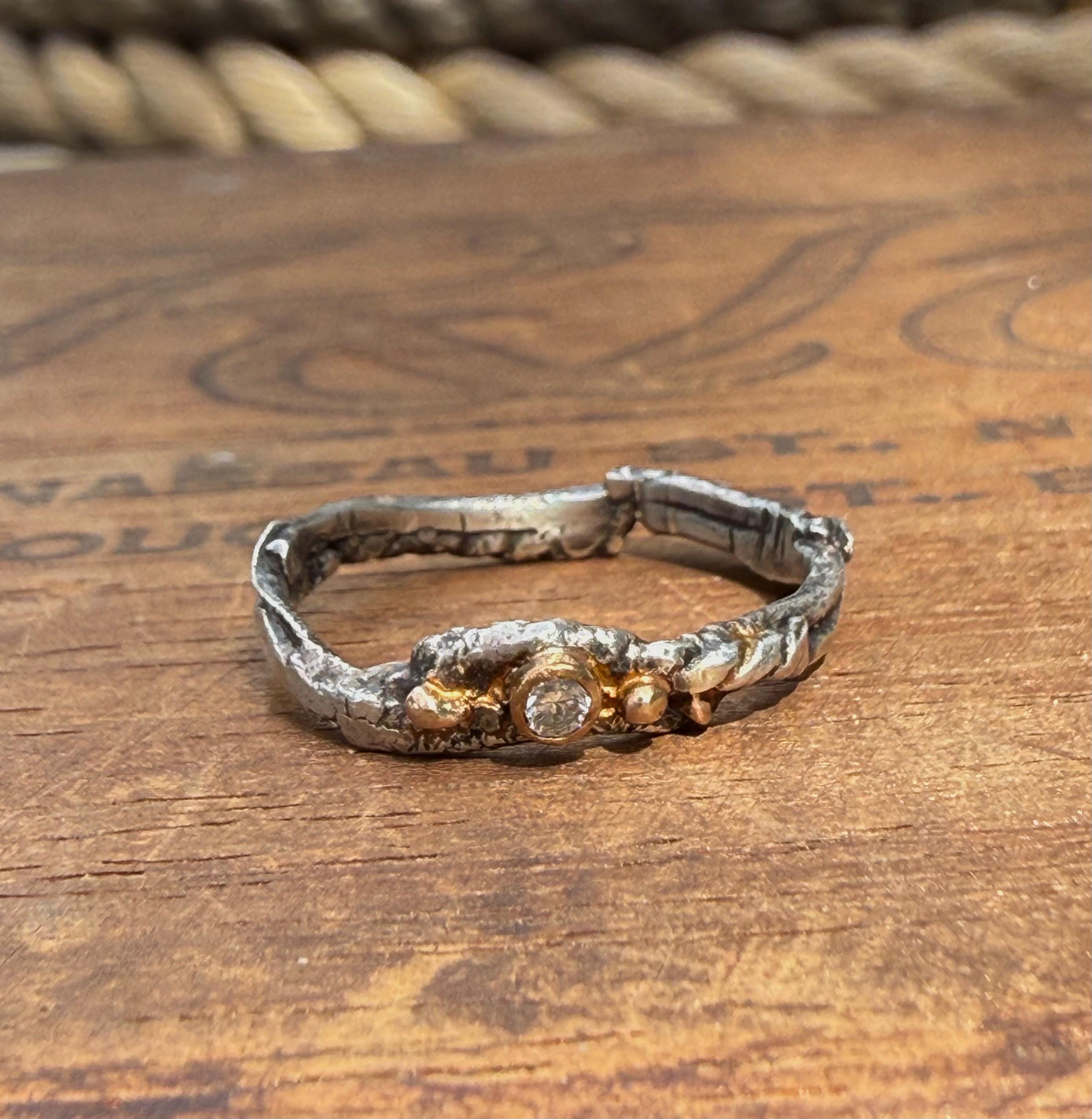 Fused Sterling Silver & Recycled 14K Gold with  a 2mm Moissanite Diamond.