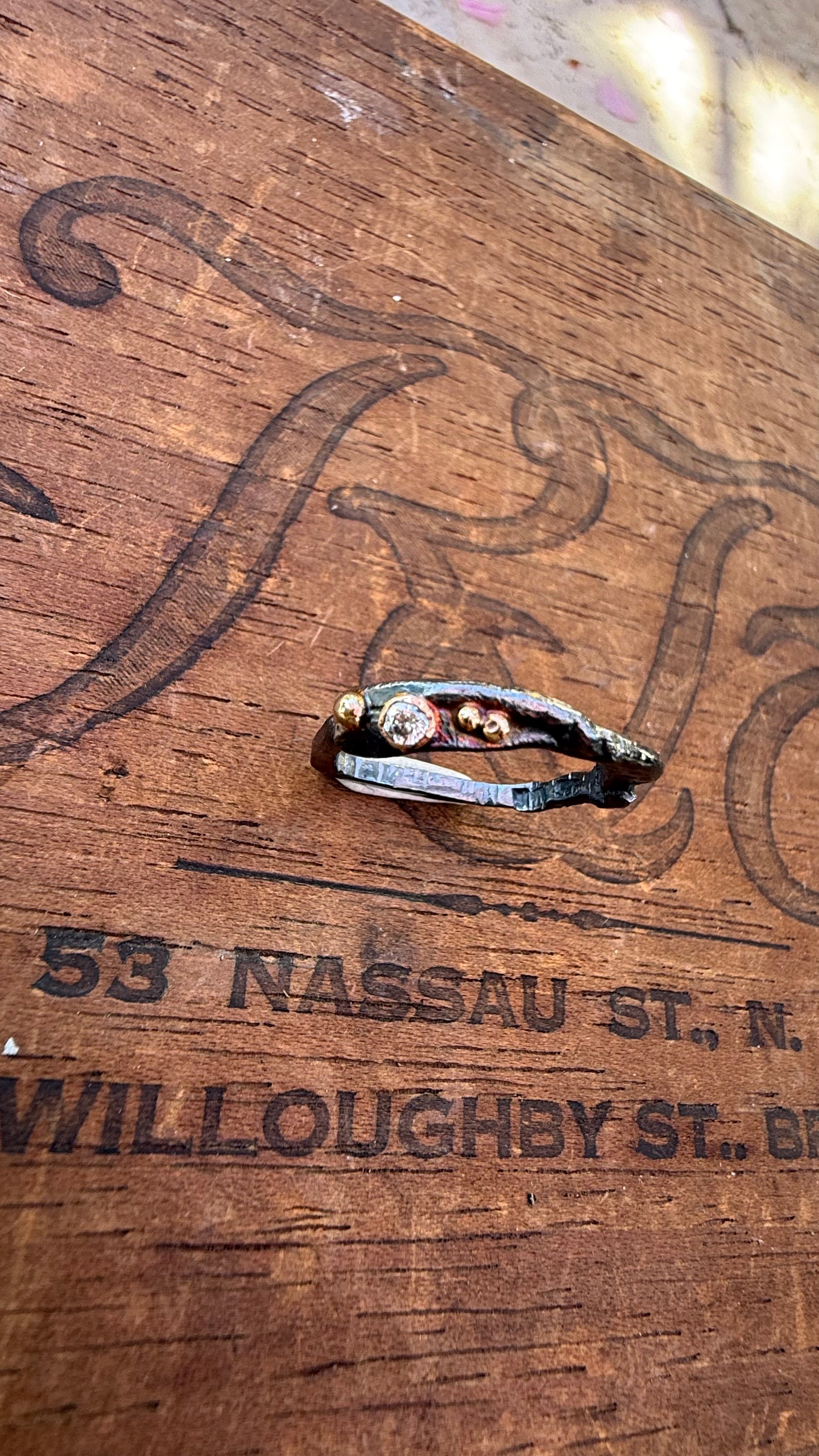 Fused Sterling Silver & Recycled 14K Gold with  a 2mm Moissanite Diamond.
