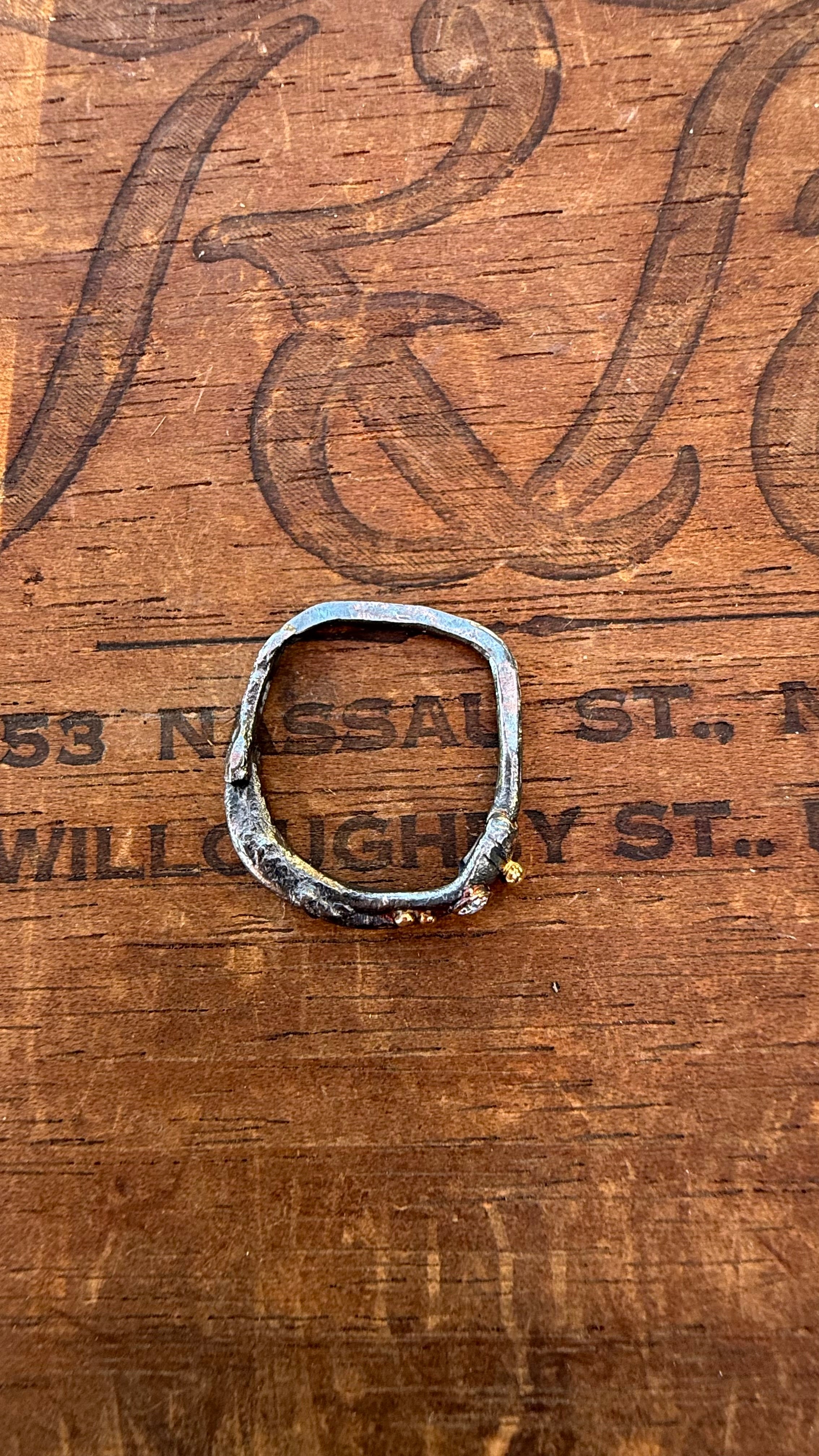 Fused Sterling Silver & Recycled 14K Gold with  a 2mm Moissanite Diamond.