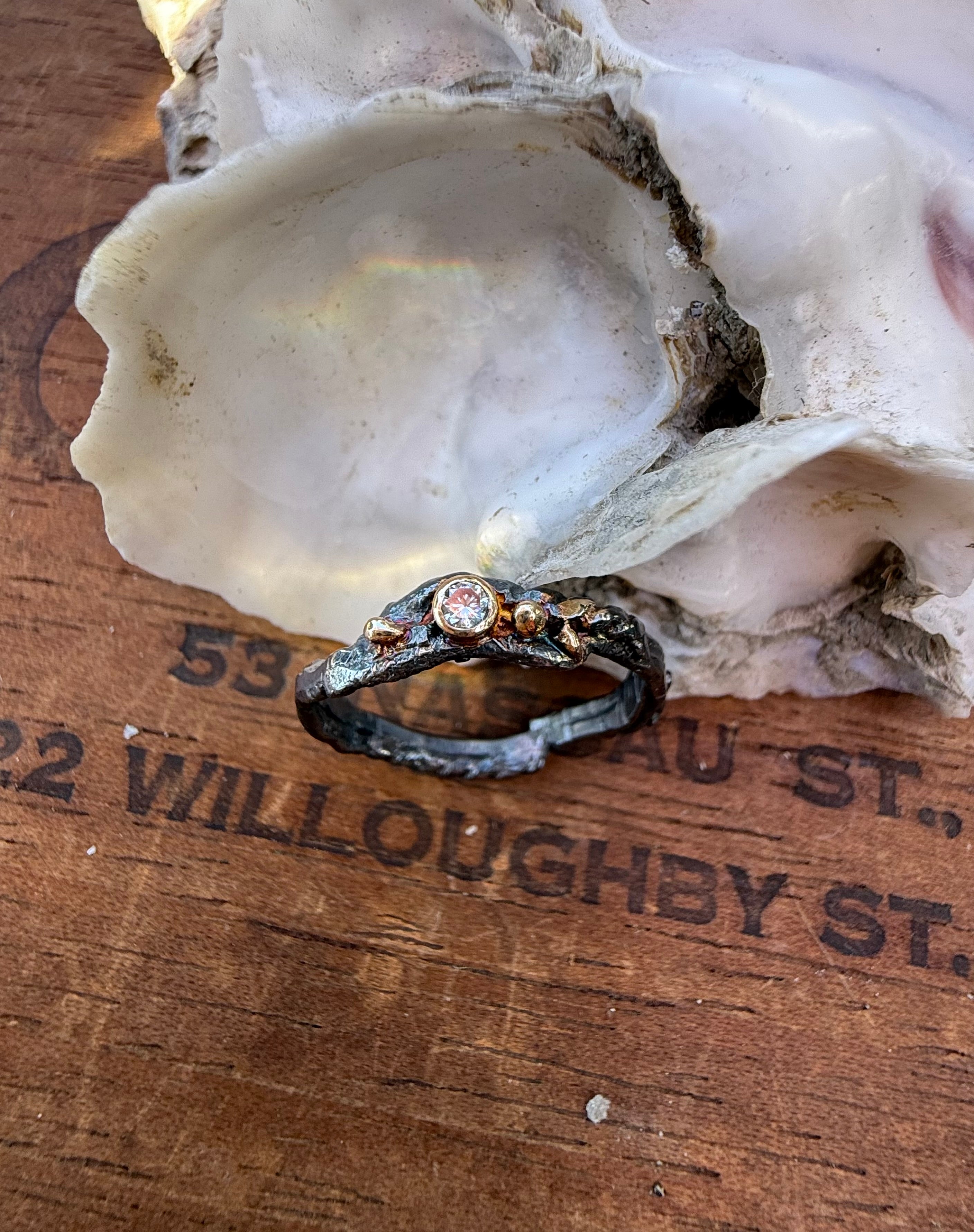 Fused Sterling Silver & Recycled 14K Gold with  a 2mm Moissanite Diamond.