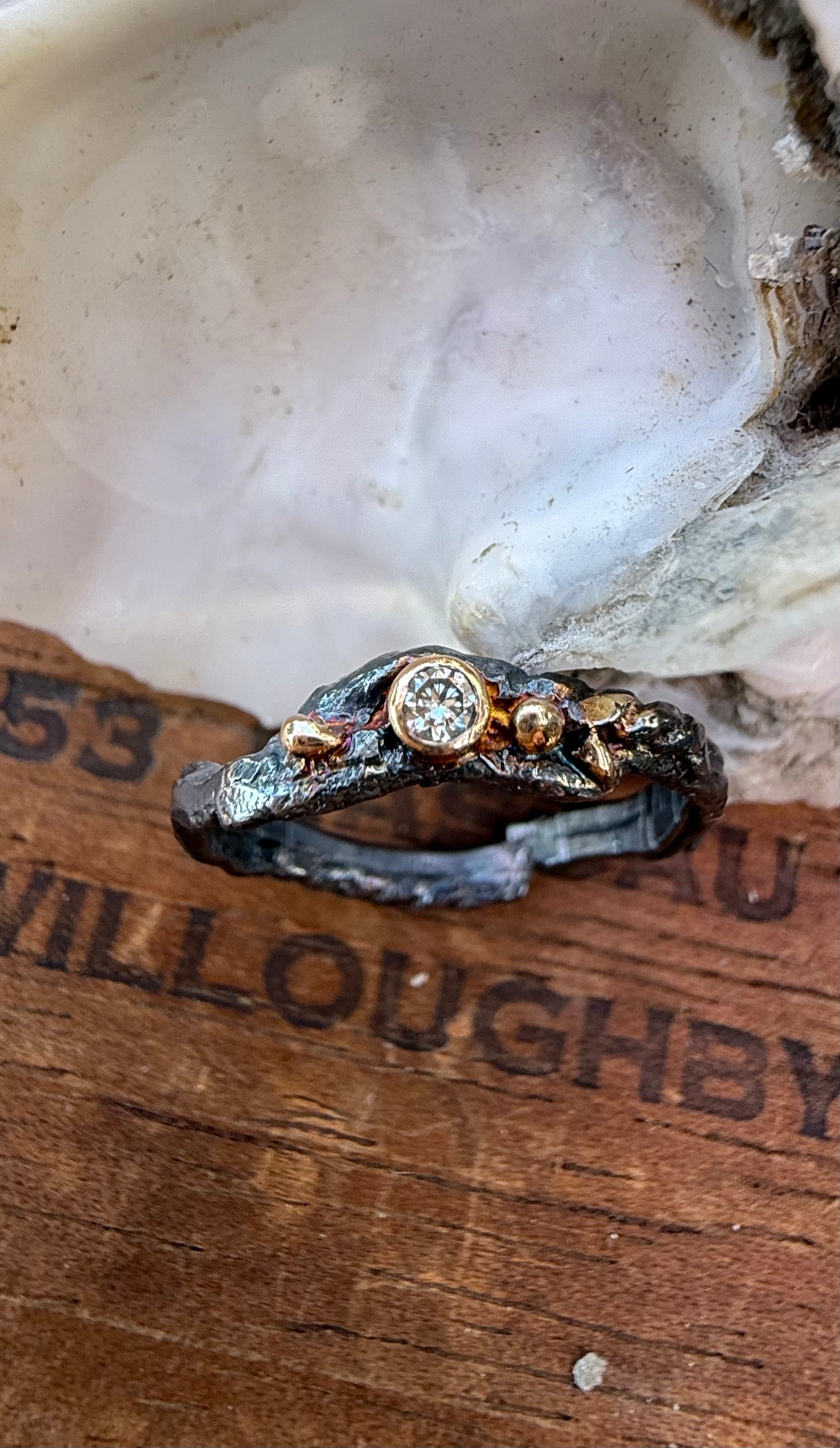 Fused Sterling Silver & Recycled 14K Gold with  a 2mm Moissanite Diamond.