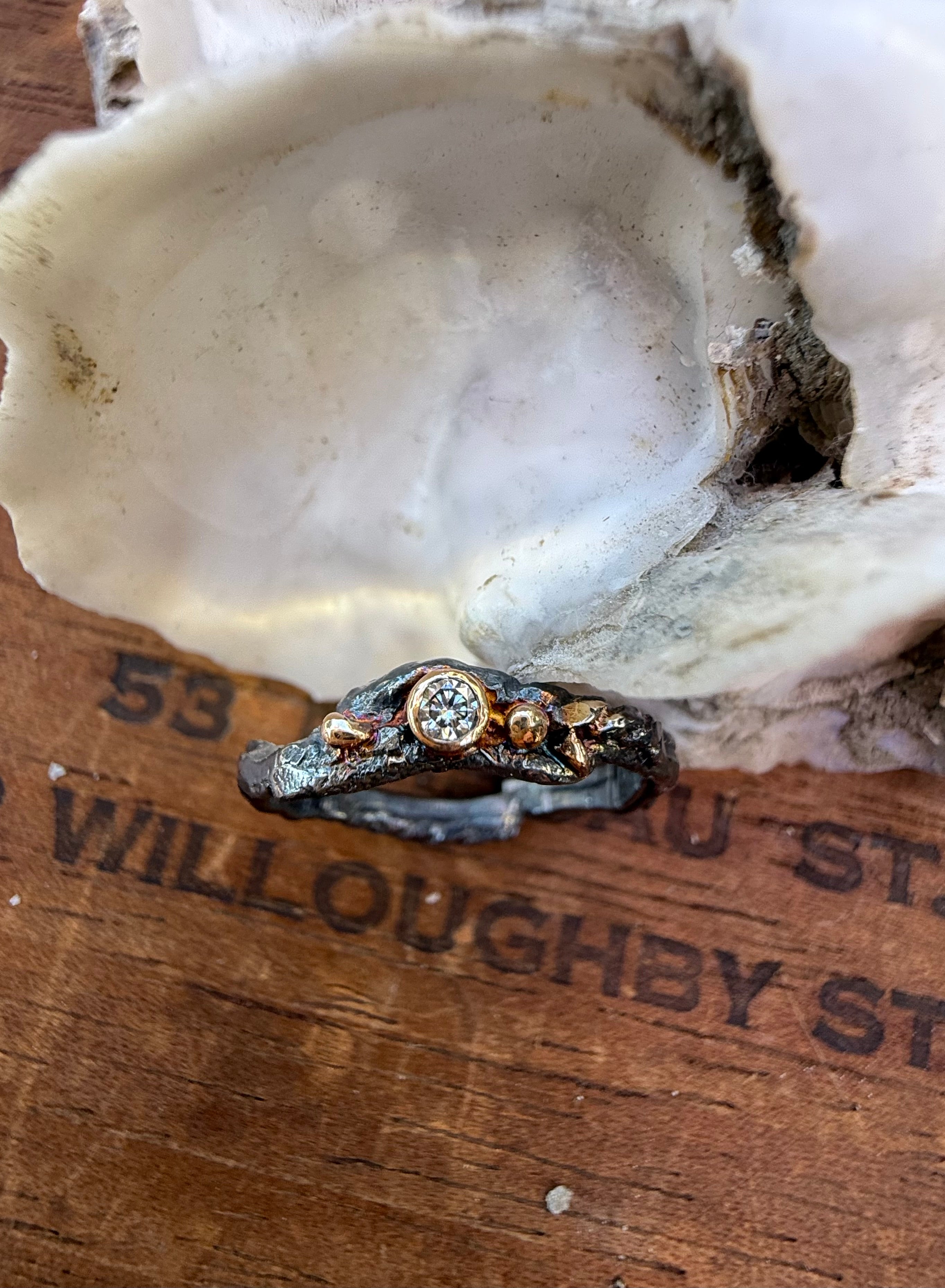 Fused Sterling Silver & Recycled 14K Gold with  a 2mm Moissanite Diamond.