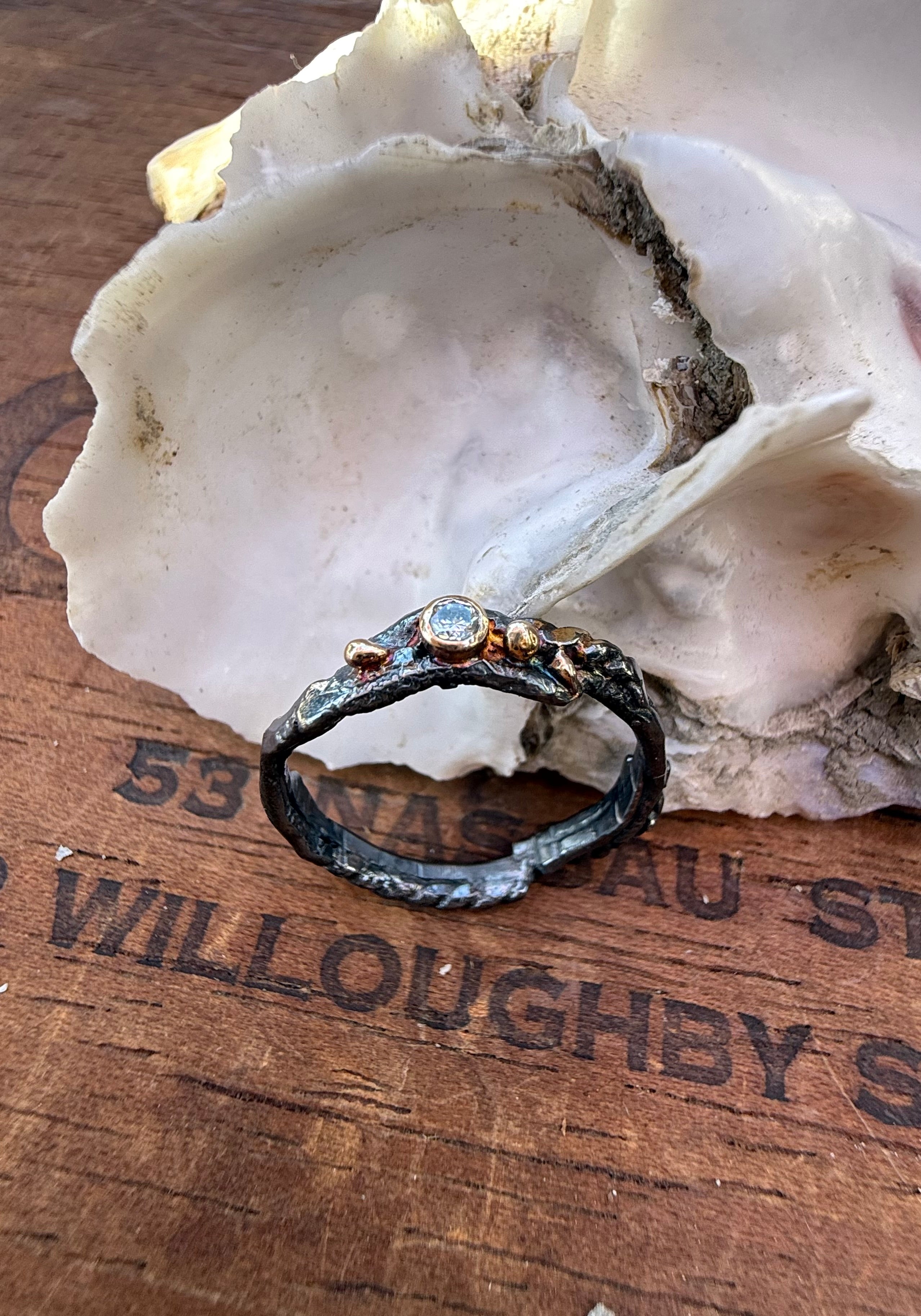 Fused Sterling Silver & Recycled 14K Gold with  a 2mm Moissanite Diamond.