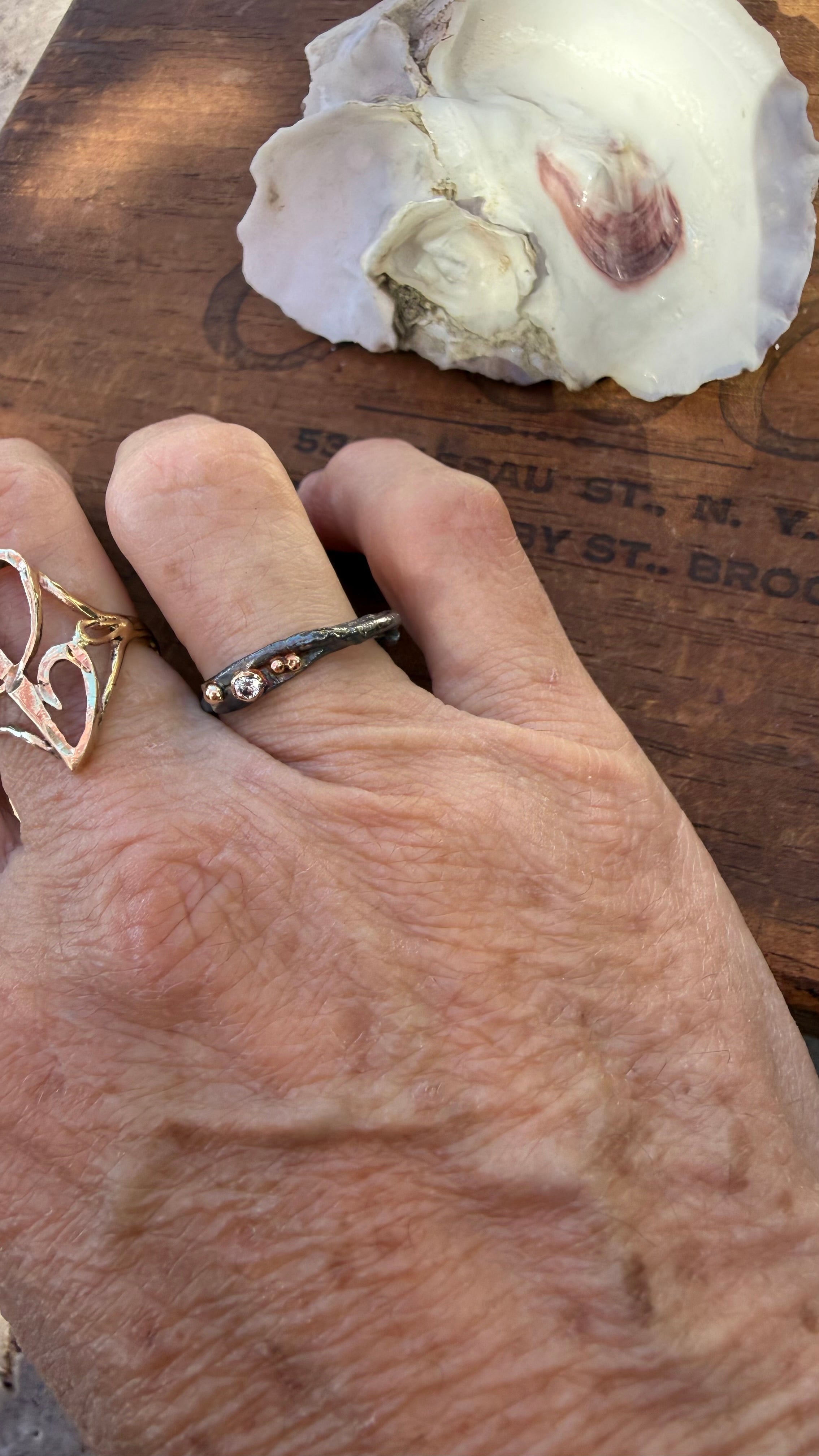 Fused Sterling Silver & Recycled 14K Gold with  a 2mm Moissanite Diamond.