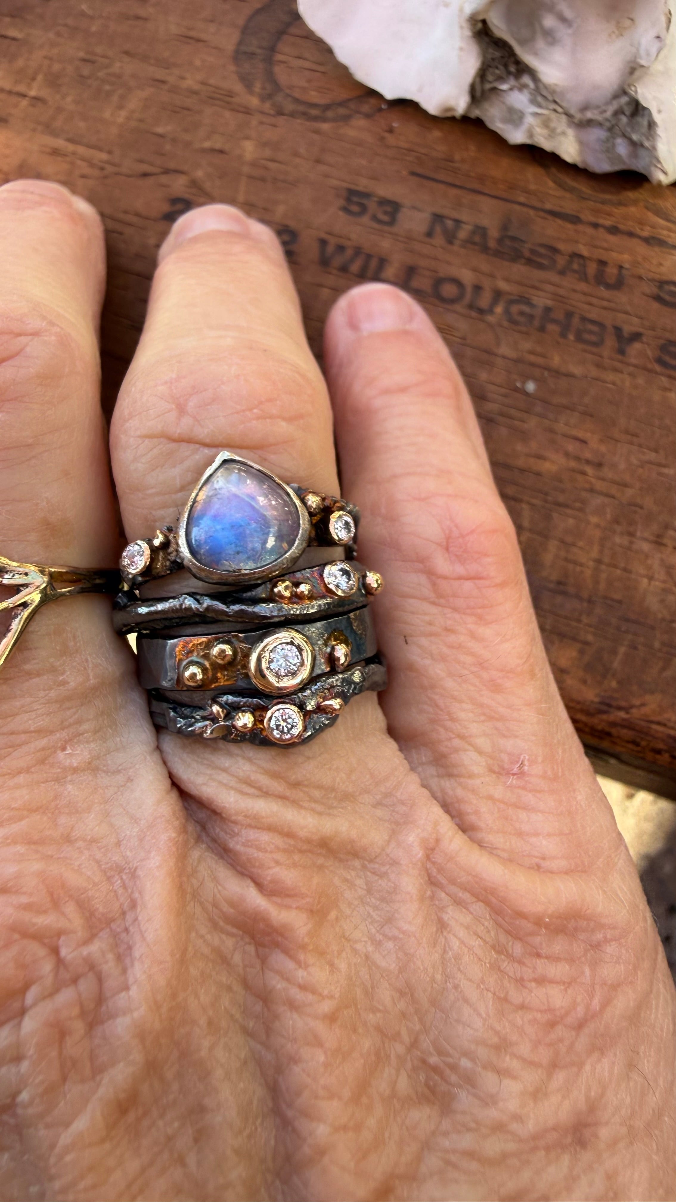 Fused Sterling Silver & Recycled 14K Gold with  a 2mm Moissanite Diamond.