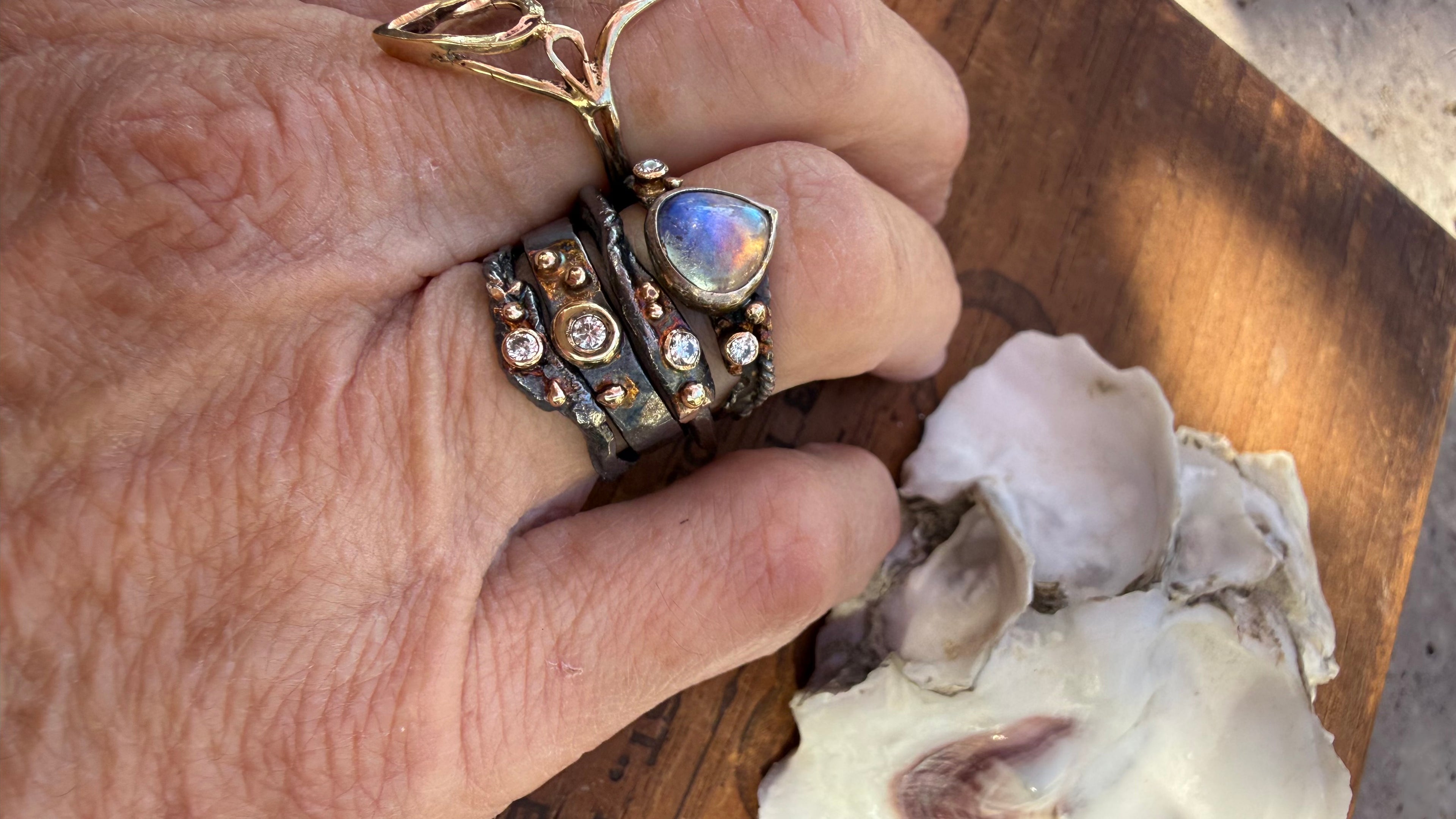 Fused Sterling Silver & Recycled 14K Gold with  a 2mm Moissanite Diamond.