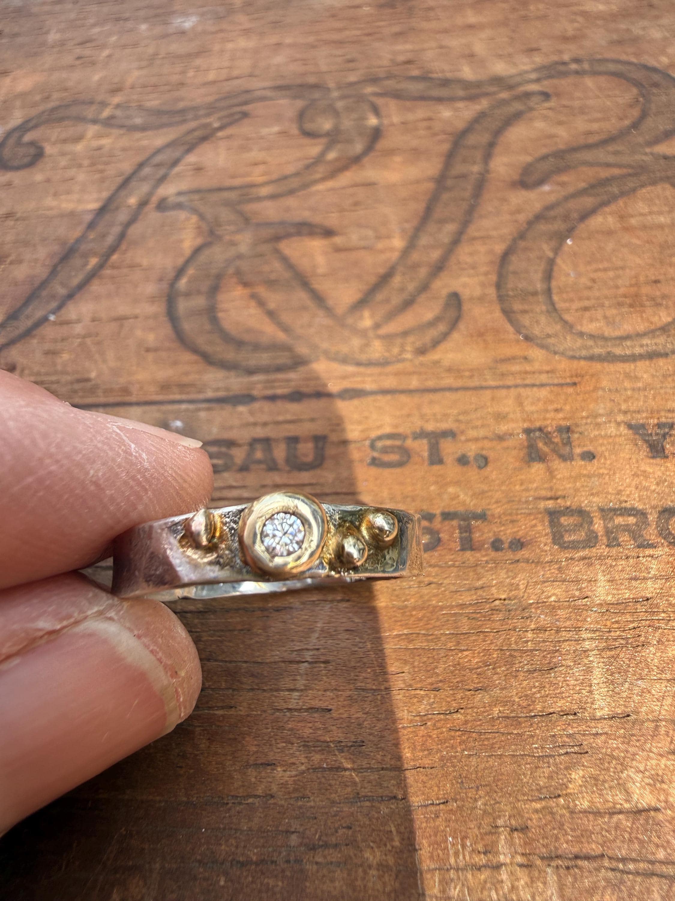 Fused Sterling Silver & Recycled 14K Gold with  a 3mm Natural Diamond.