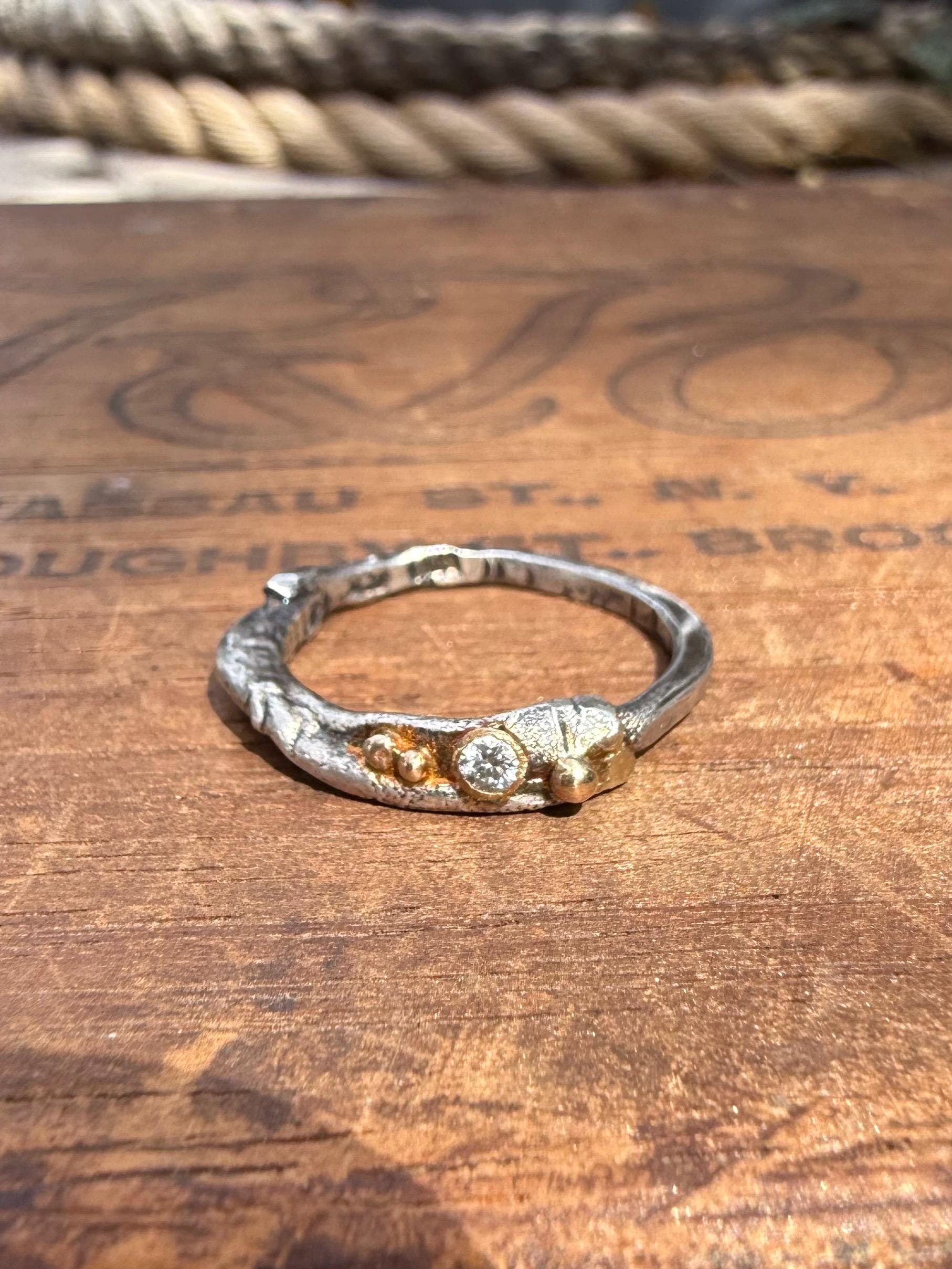 Fused Sterling Silver & Recycled 14K Gold with  a 2mm Moissanite Diamond.