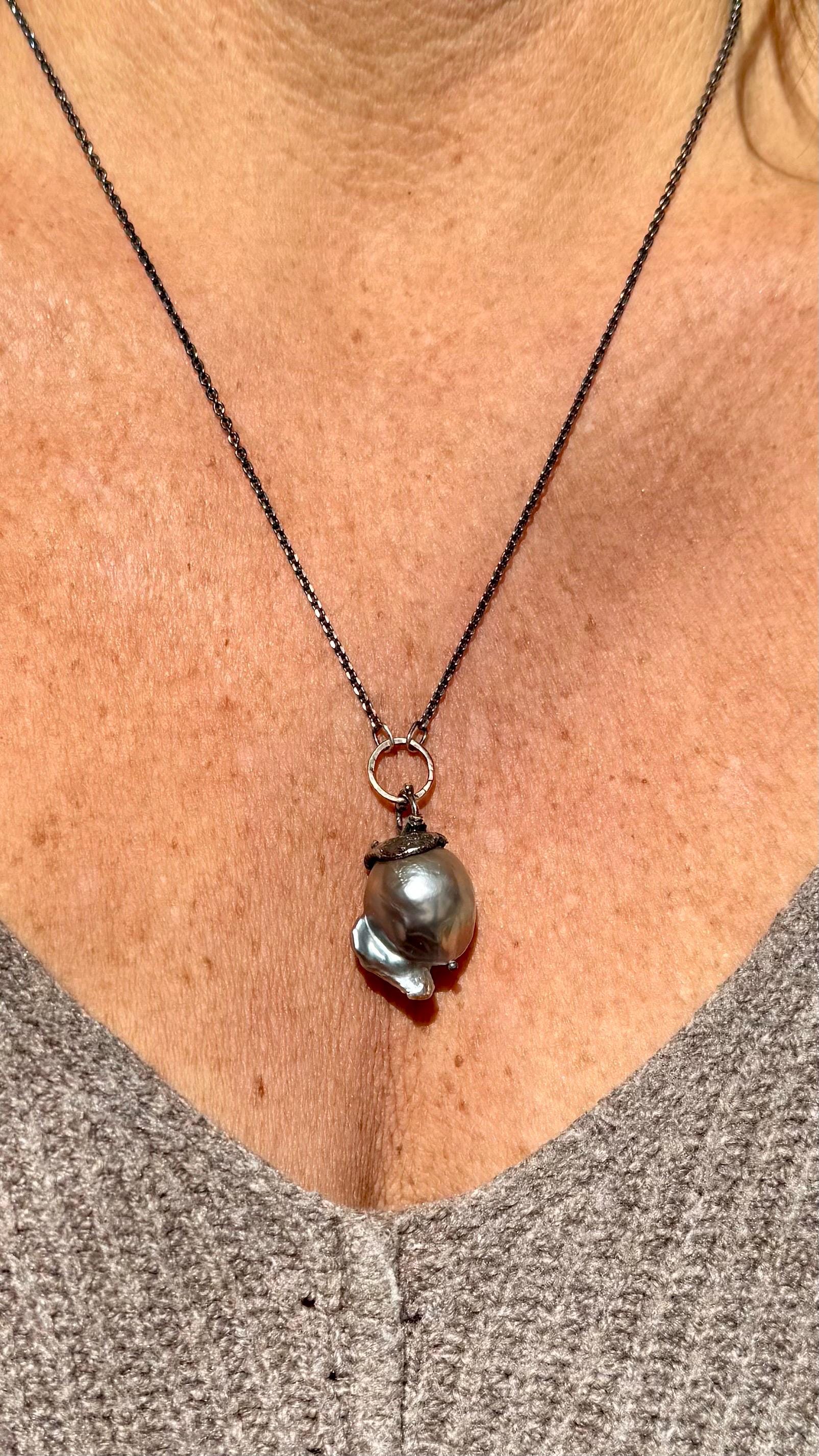 Giant Black Baroque Pearl Necklace with Sterling silver Chain and 14k Gold; 24” long.