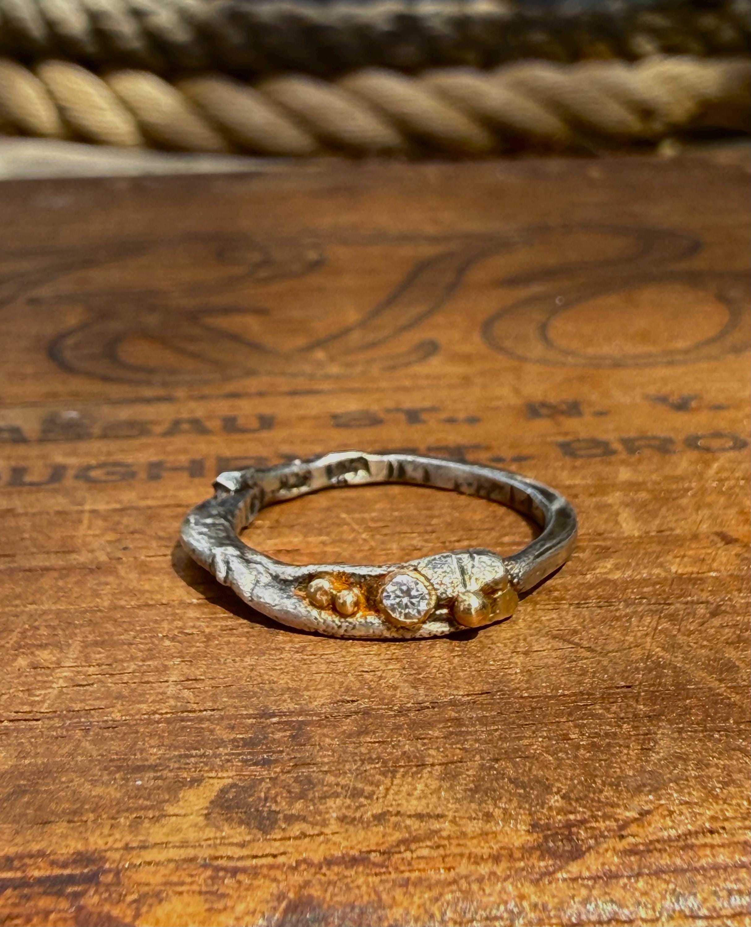 Fused Sterling Silver & Recycled 14K Gold with  a 2mm Moissanite Diamond.
