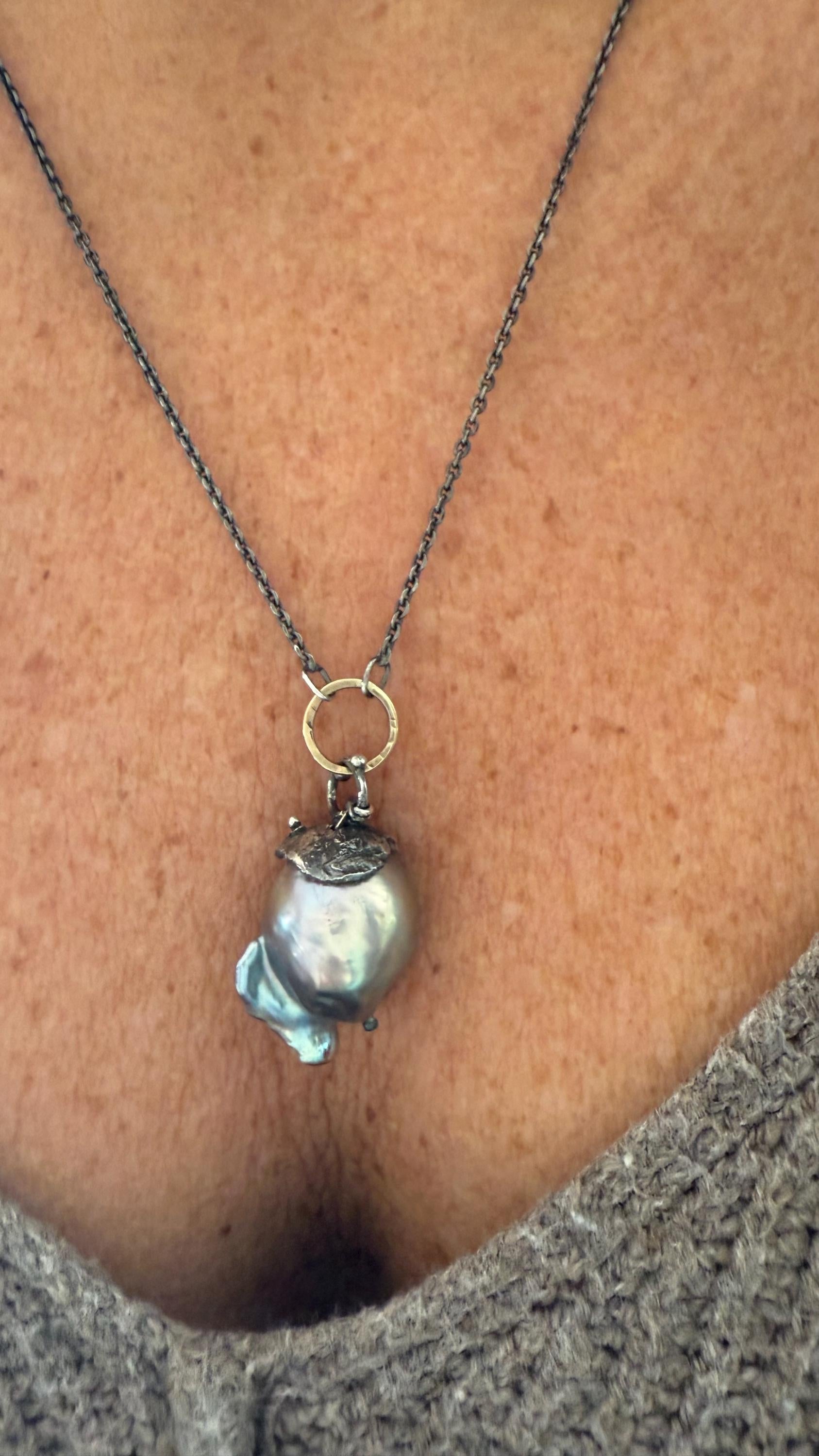 Giant Black Baroque Pearl Necklace with Sterling silver Chain and 14k Gold; 24” long.